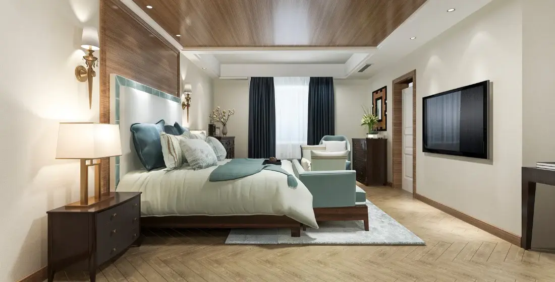 Professional mounting a large TV on a wall